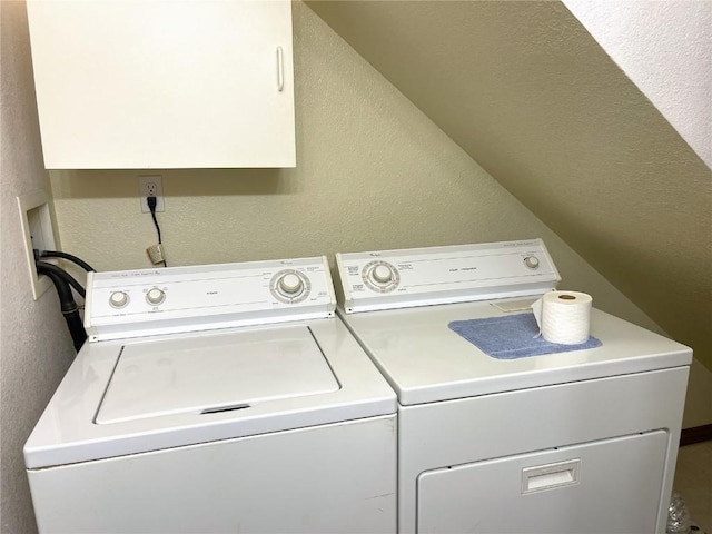 clothes washing area with independent washer and dryer