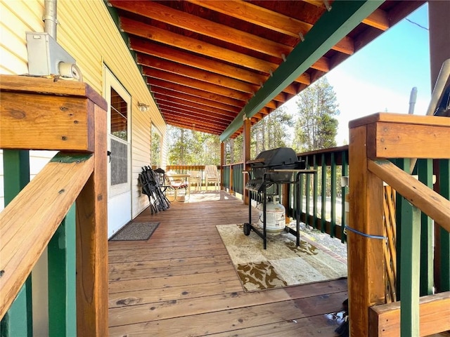 wooden terrace with grilling area