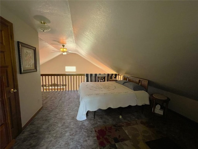 carpeted bedroom with ceiling fan, lofted ceiling, and a textured ceiling