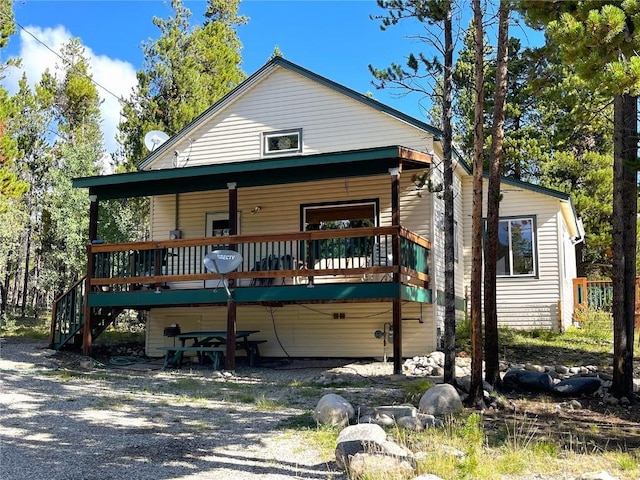 view of front of property featuring a deck