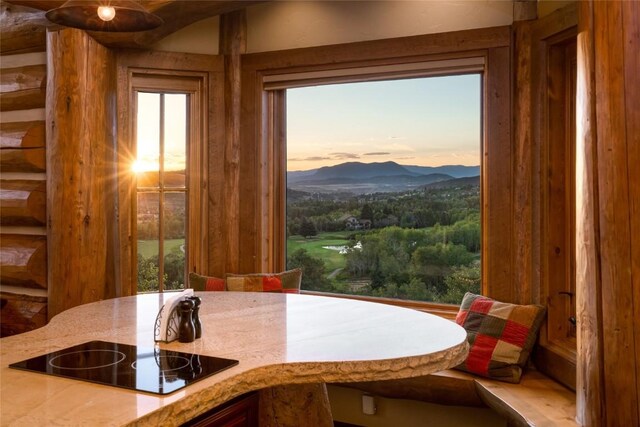 dining area with a mountain view