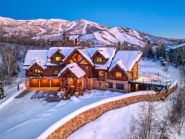 log cabin with a mountain view