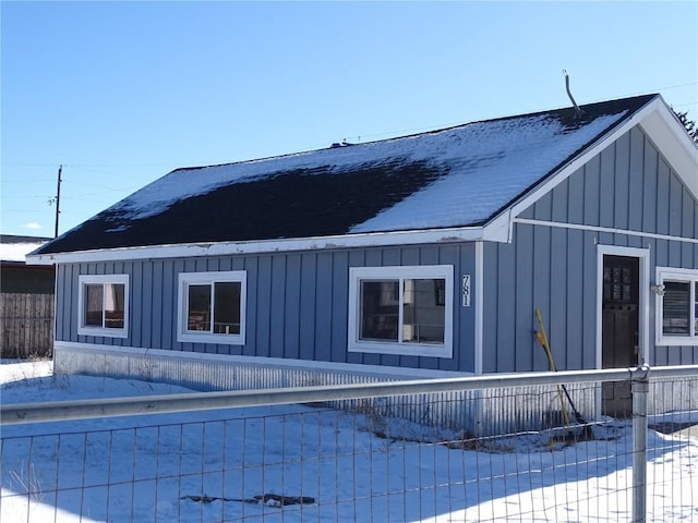 view of snow covered property