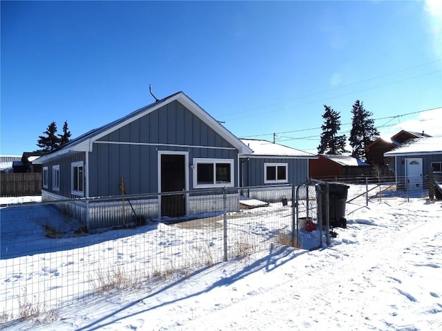 view of snow covered property