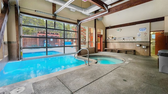 view of pool with an indoor in ground hot tub