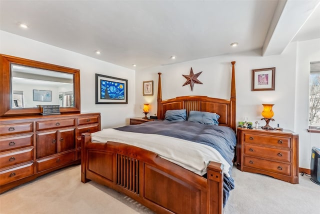 bedroom featuring light carpet