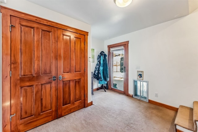 interior space with light colored carpet