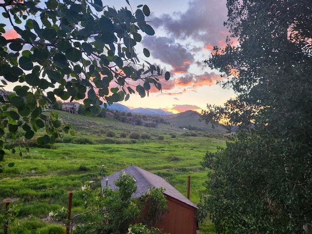 view of mountain feature featuring a rural view