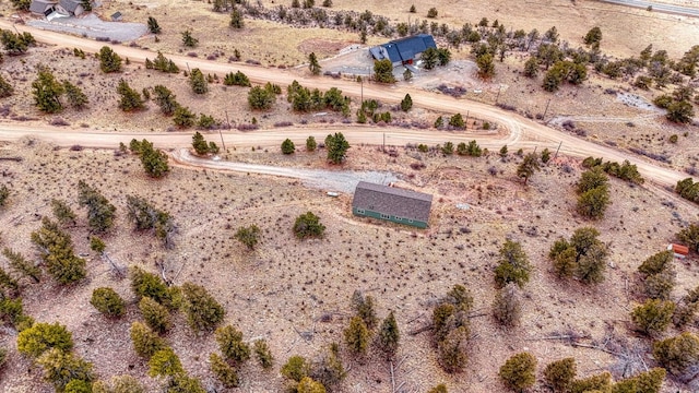 drone / aerial view with a desert view and a rural view