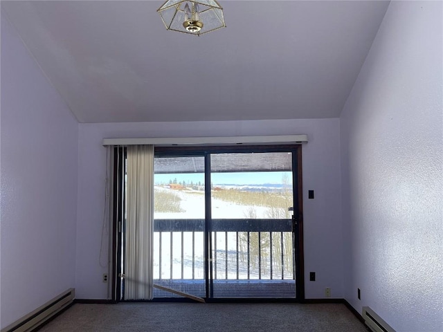 carpeted empty room featuring baseboard heating, a water view, and lofted ceiling