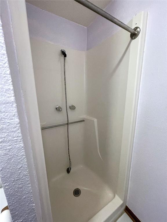 bathroom with a shower