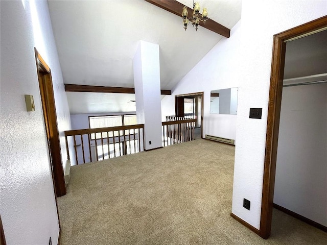 interior space featuring carpet, high vaulted ceiling, a baseboard heating unit, beamed ceiling, and a chandelier