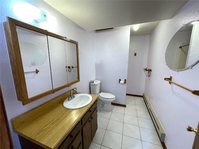 bathroom with vanity, a baseboard heating unit, tile patterned floors, toilet, and a textured ceiling