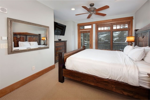 carpeted bedroom with ceiling fan