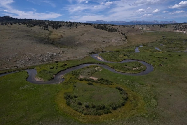 bird's eye view with a mountain view