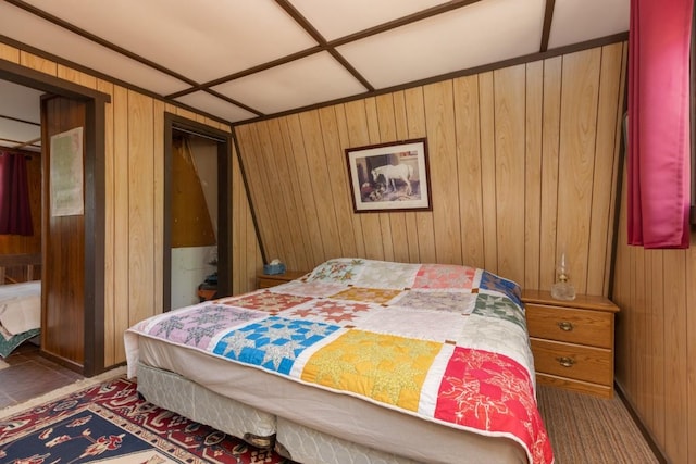 bedroom with wooden walls