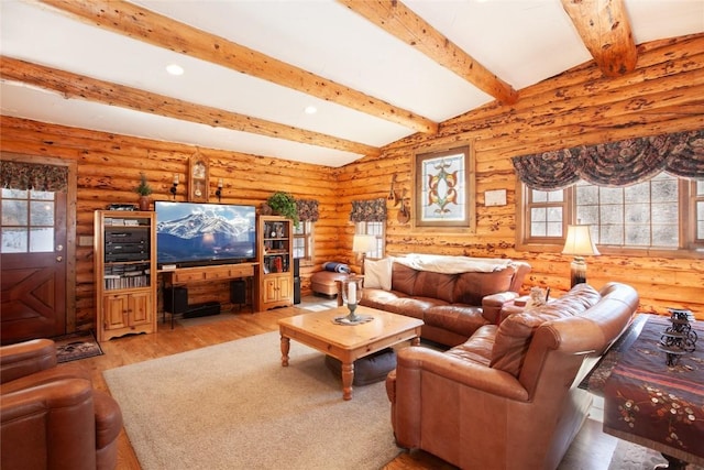 living room with beamed ceiling, wood-type flooring, and rustic walls