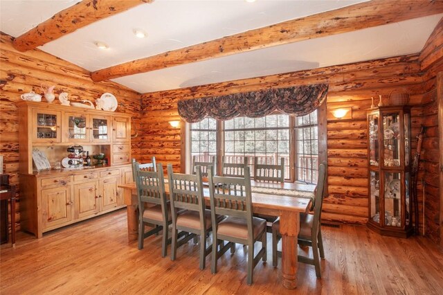 office area with beamed ceiling, hardwood / wood-style flooring, and wood ceiling