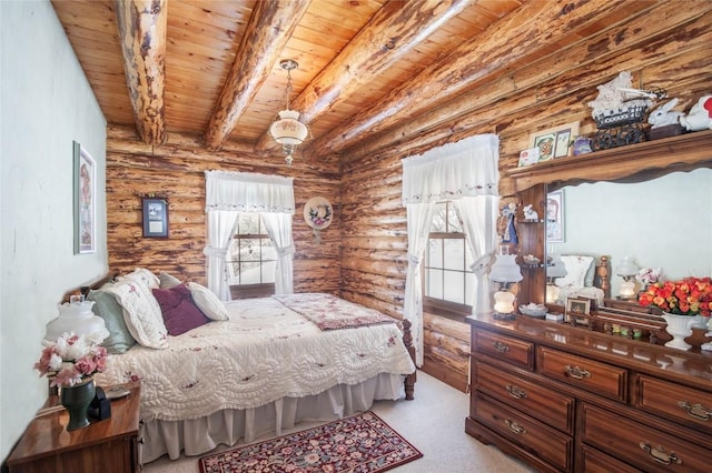 bedroom with beamed ceiling, carpet floors, and wooden ceiling