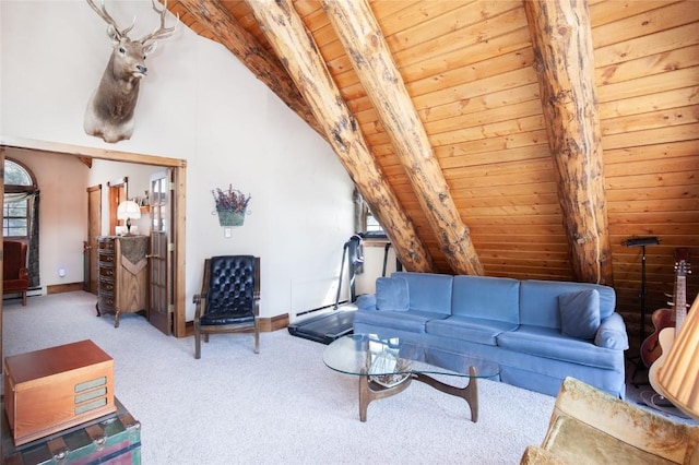 carpeted living room with wood ceiling, lofted ceiling with beams, and baseboards