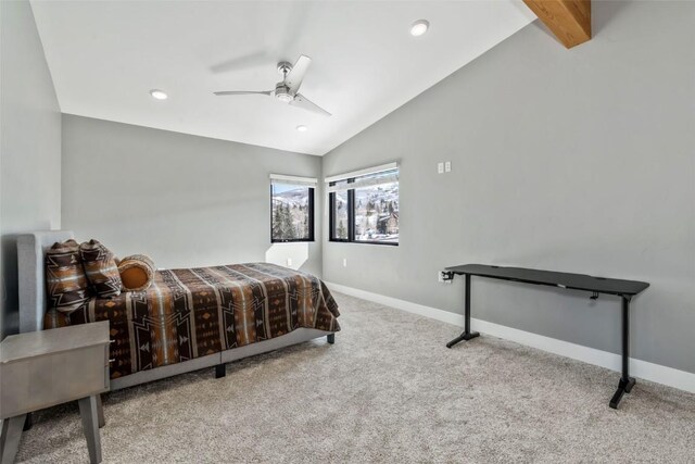 living room featuring light carpet, lofted ceiling with beams, and ceiling fan