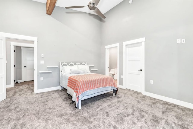 bedroom featuring carpet flooring, ceiling fan, beamed ceiling, and high vaulted ceiling