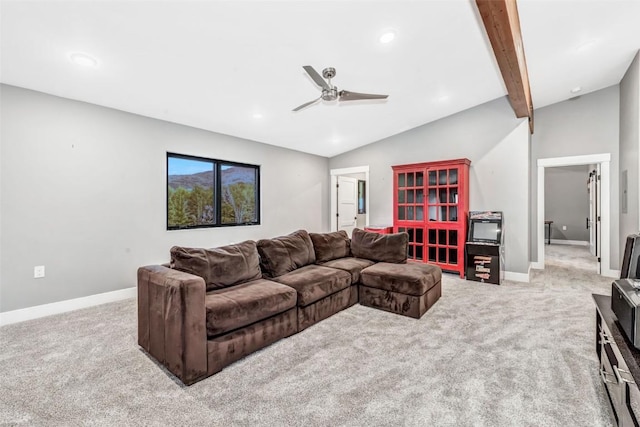 carpeted living room with vaulted ceiling with beams and ceiling fan