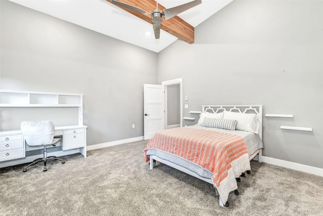 carpeted bedroom with ceiling fan, beamed ceiling, and high vaulted ceiling