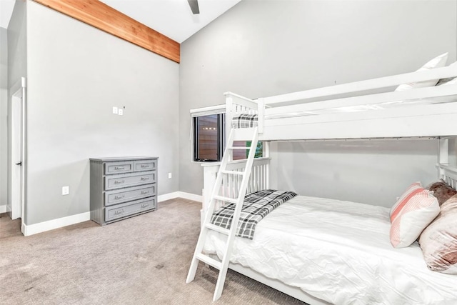 bedroom featuring carpet flooring, ceiling fan, and lofted ceiling