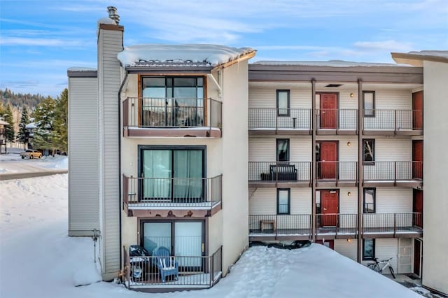 view of snow covered property