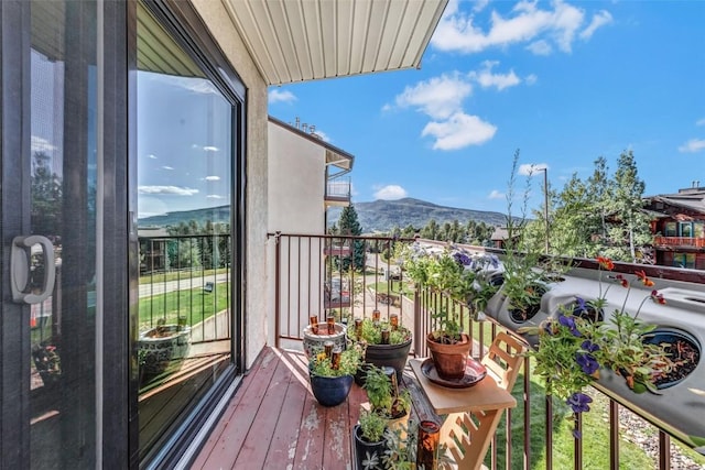 balcony featuring a mountain view