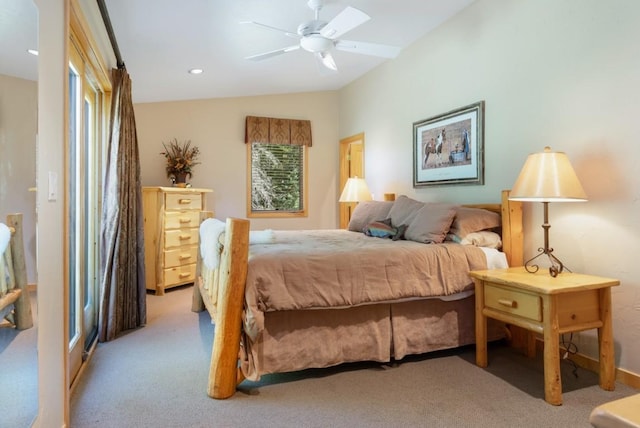 carpeted bedroom featuring ceiling fan and lofted ceiling