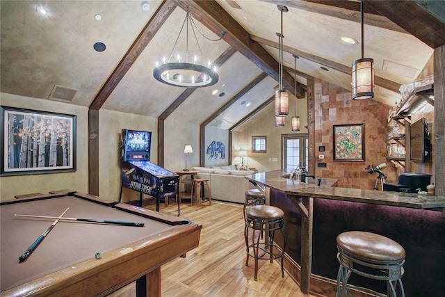 game room featuring french doors, lofted ceiling with beams, a notable chandelier, billiards, and light wood-type flooring