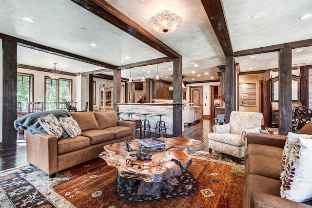 living room with beam ceiling and dark wood-type flooring