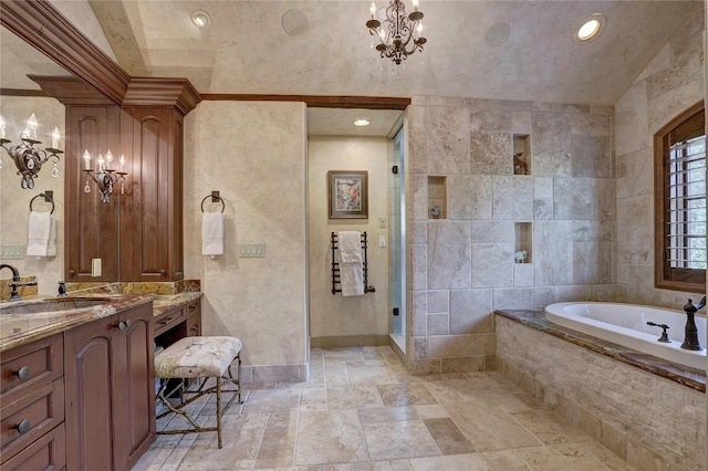 bathroom with an inviting chandelier, vaulted ceiling, shower with separate bathtub, vanity, and tile walls