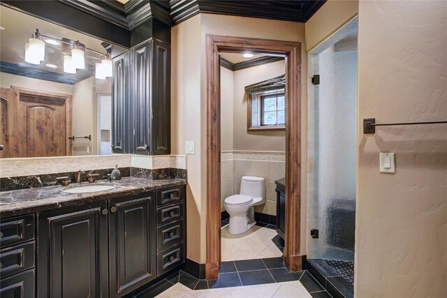 bathroom with crown molding, tile patterned flooring, a shower, and tile walls