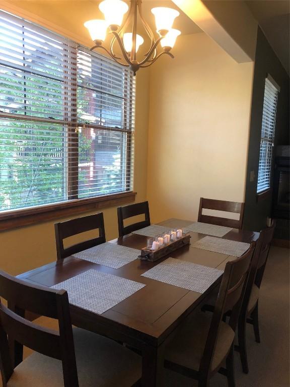 dining room featuring a notable chandelier