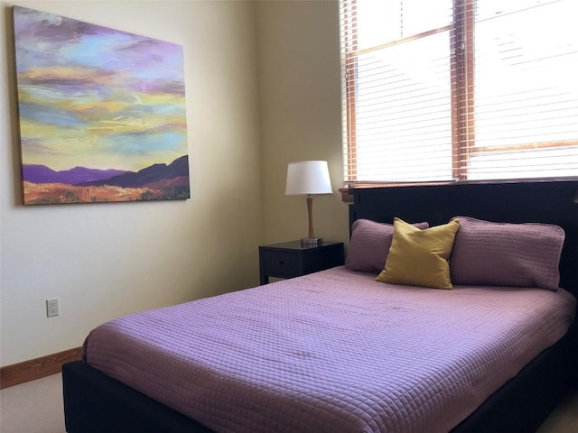 bedroom with baseboards