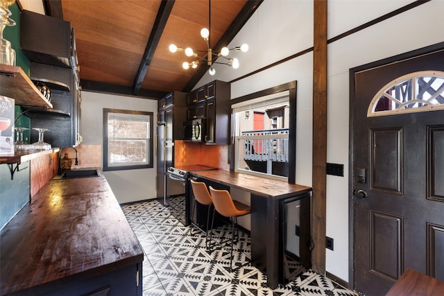 office area with a sink, an inviting chandelier, wooden ceiling, light floors, and vaulted ceiling with beams