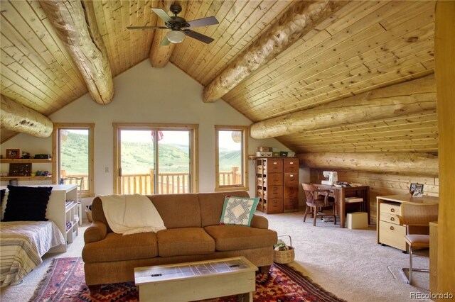 carpeted living room featuring vaulted ceiling with beams, ceiling fan, wooden walls, and wooden ceiling