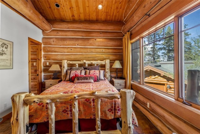 bedroom with rustic walls and wood ceiling