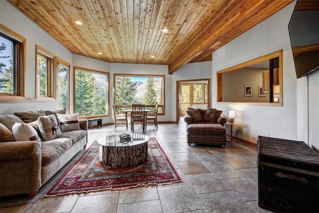 living room with beamed ceiling and wooden ceiling