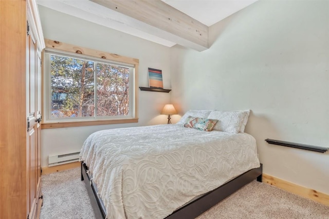 carpeted bedroom with beamed ceiling and baseboard heating