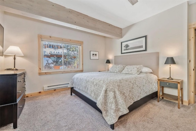 bedroom with beam ceiling, baseboard heating, and carpet floors