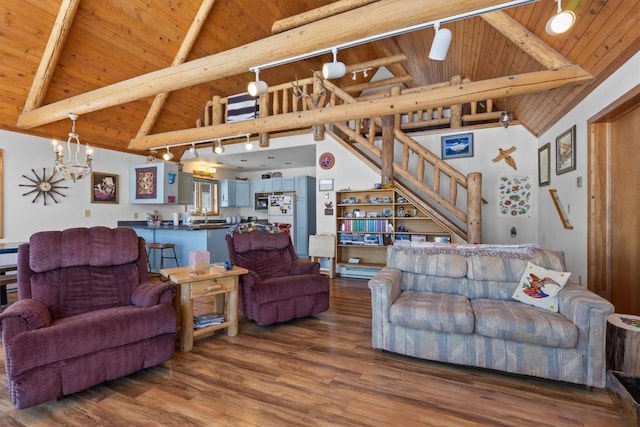 living room with wood ceiling, lofted ceiling with beams, stairs, wood finished floors, and a notable chandelier