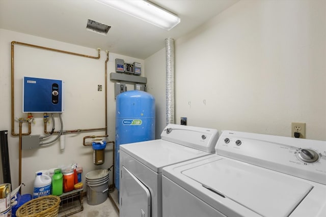 laundry room with laundry area and separate washer and dryer