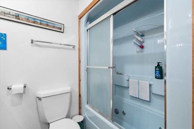 full bath featuring enclosed tub / shower combo and toilet