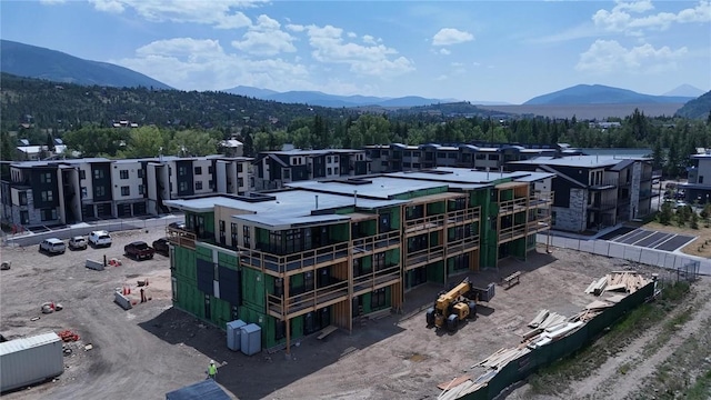 drone / aerial view featuring a mountain view