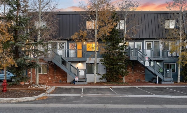 view of outdoor building at dusk