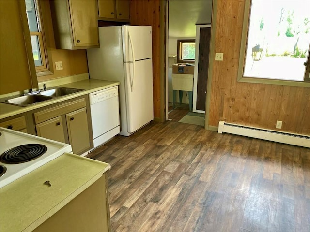 kitchen featuring white dishwasher, a baseboard radiator, dark wood-type flooring, a sink, and light countertops